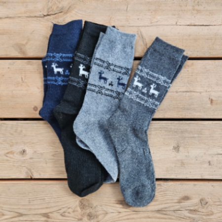 Skarpety 95% wełny merino Norra villa wzór w renifery